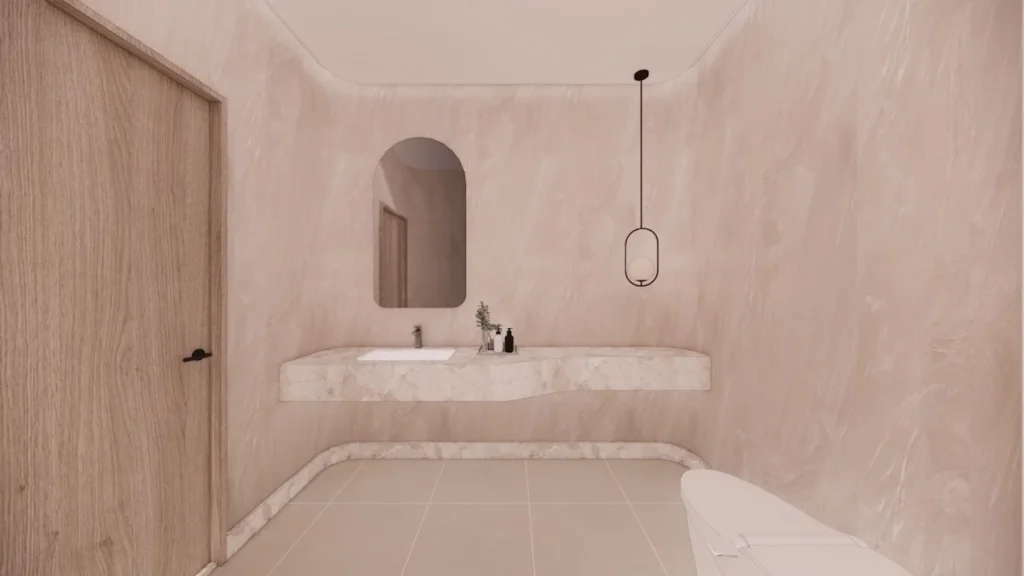 琢和診所的簡約米色系洗手間,設有弧形鏡子、檯面和懸掛式燈具。